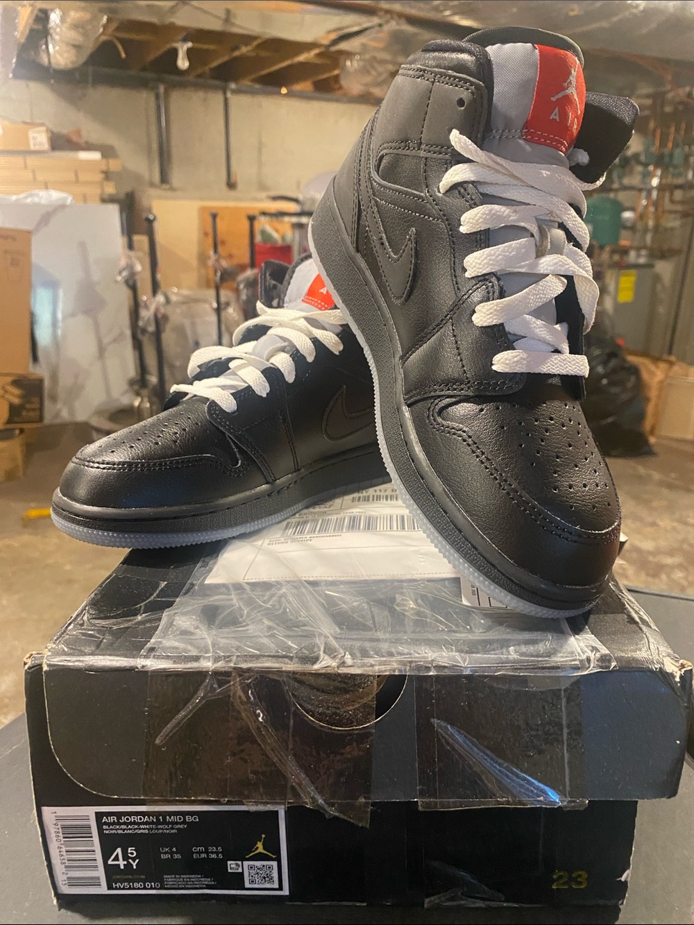 Nike Air Jordan 1 Mid - Black with White Laces and Red Tongue